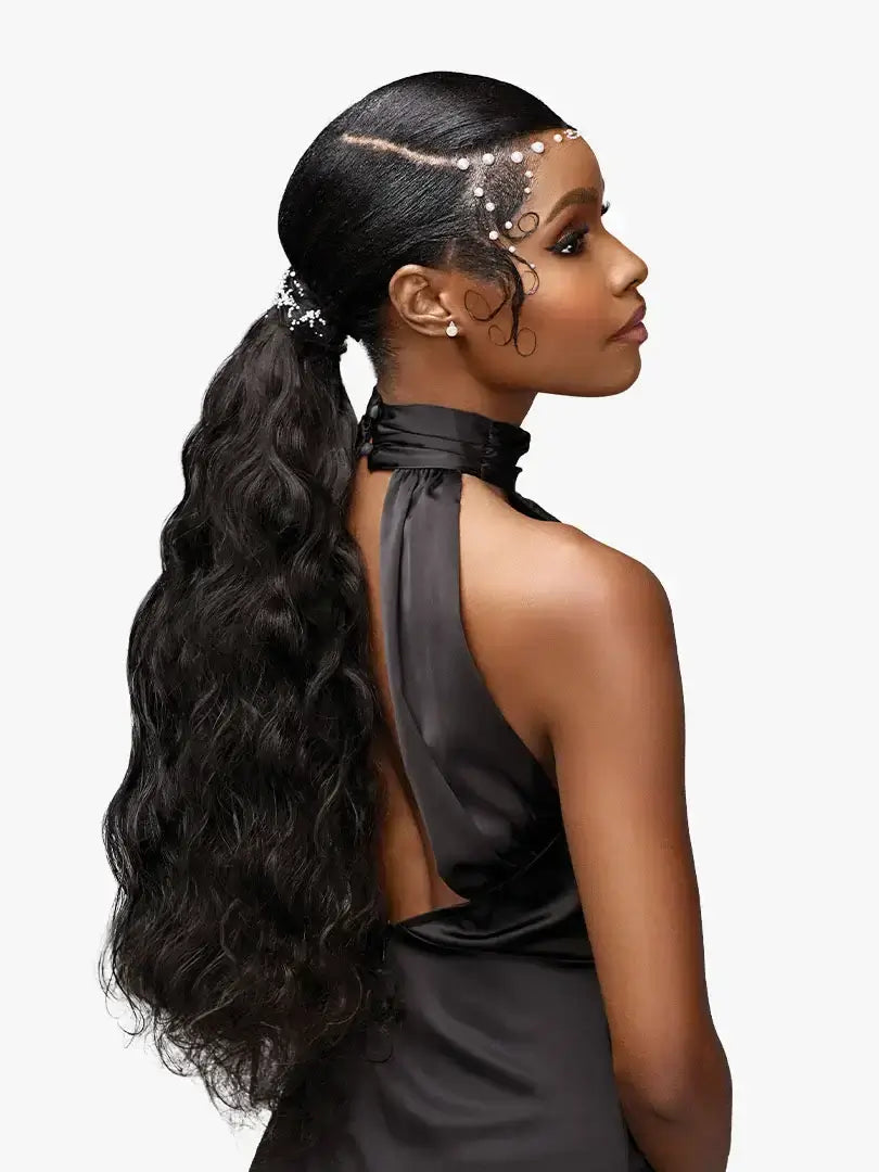 Partial back profile of a model with Sensationnel® Pearlish™ Euro Body Wave hair extensions